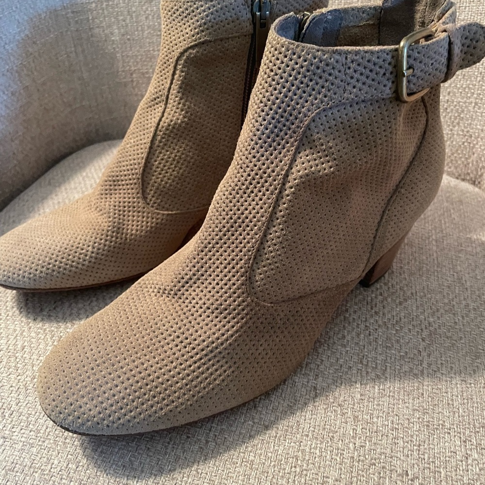 Tan perforated booties by Aquatalia